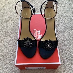 Coach High heels never been worn. Black satin w/beads 8.5 approx 3 1/2 in heel